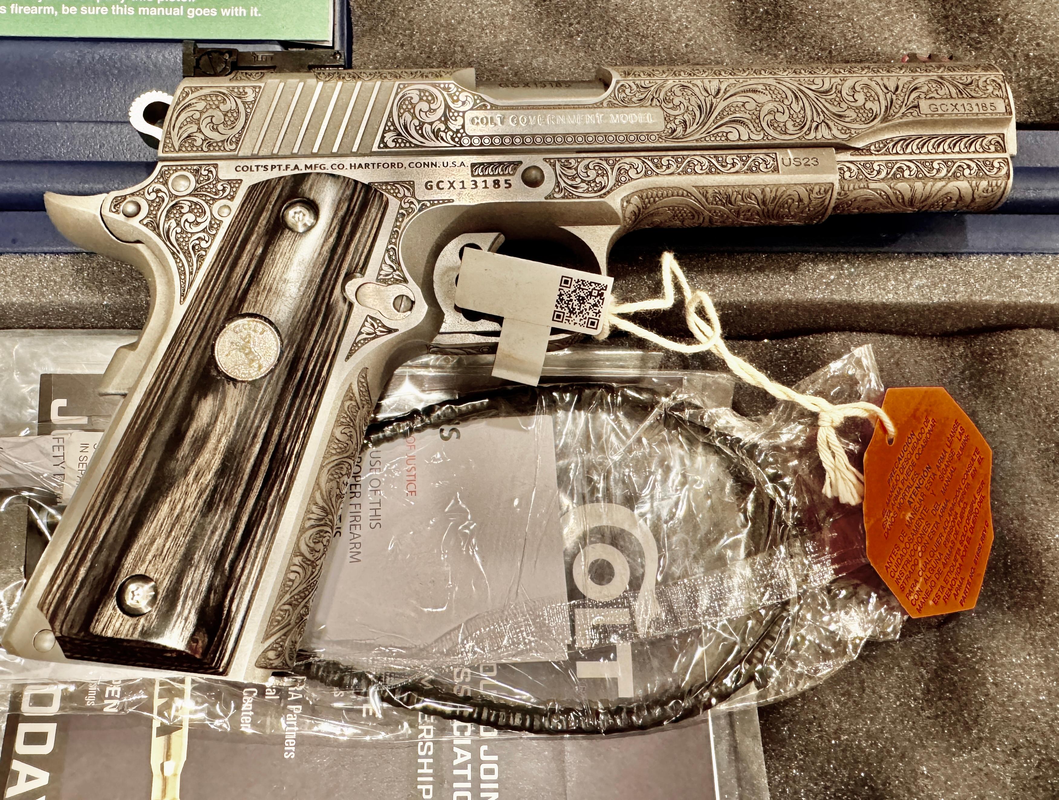 Handguns Absolutely BREATHTAKING Colt 1911 with Full Coverage Custom Engraving! image 1