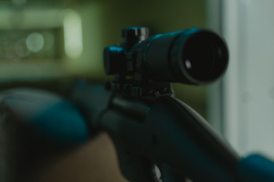 Close-Up Shot Of Scope On Gun